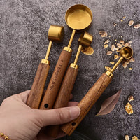Elegant Gold Wooden Handle Stainless Steel Measuring Cups & Spoons Set 1