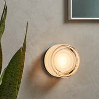 FORMELLE – Applique da parete scolpita per un’illuminazione d’atmosfera elegante