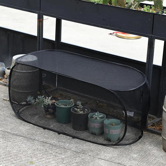 GROWSAFE - Protective mesh greenhouse cover designed to shield plants naturally outdoors.
