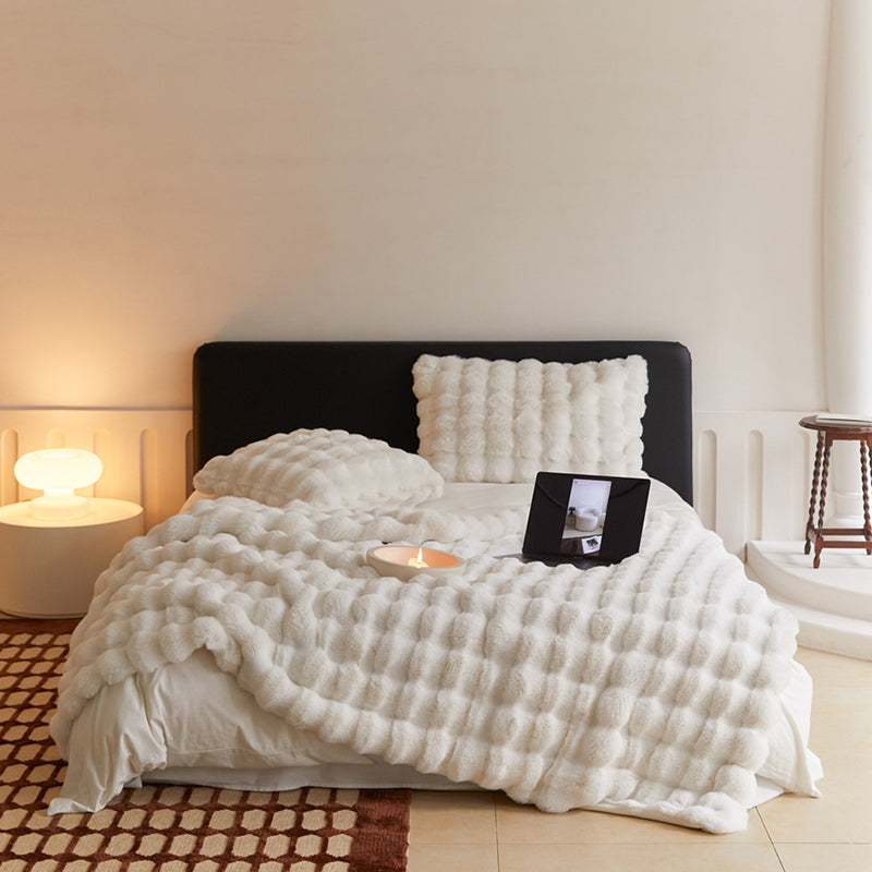 PLUMERIA – Coperta ultra morbida per un comfort raffinato in casa