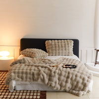 PLUMERIA – Coperta ultra morbida per un comfort raffinato in casa