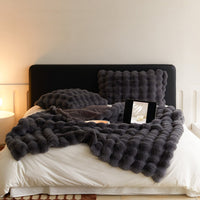 PLUMERIA – Coperta ultra morbida per un comfort raffinato in casa