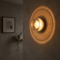 FORMELLE – Applique da parete scolpita per un’illuminazione d’atmosfera elegante