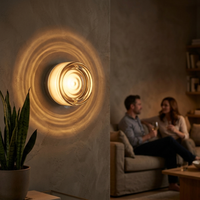 FORMELLE – Applique da parete scolpita per un’illuminazione d’atmosfera elegante