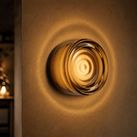 FORMELLE – Applique da parete scolpita per un’illuminazione d’atmosfera elegante