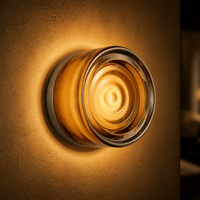 FORMELLE – Applique da parete scolpita per un’illuminazione d’atmosfera elegante