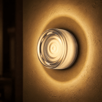 FORMELLE – Applique da parete scolpita per un’illuminazione d’atmosfera elegante